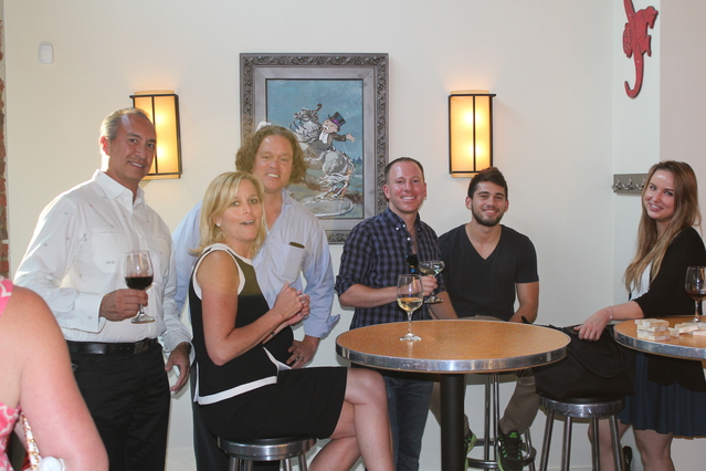 Happy guests at the Attache Corporate Housing Happy Hour
